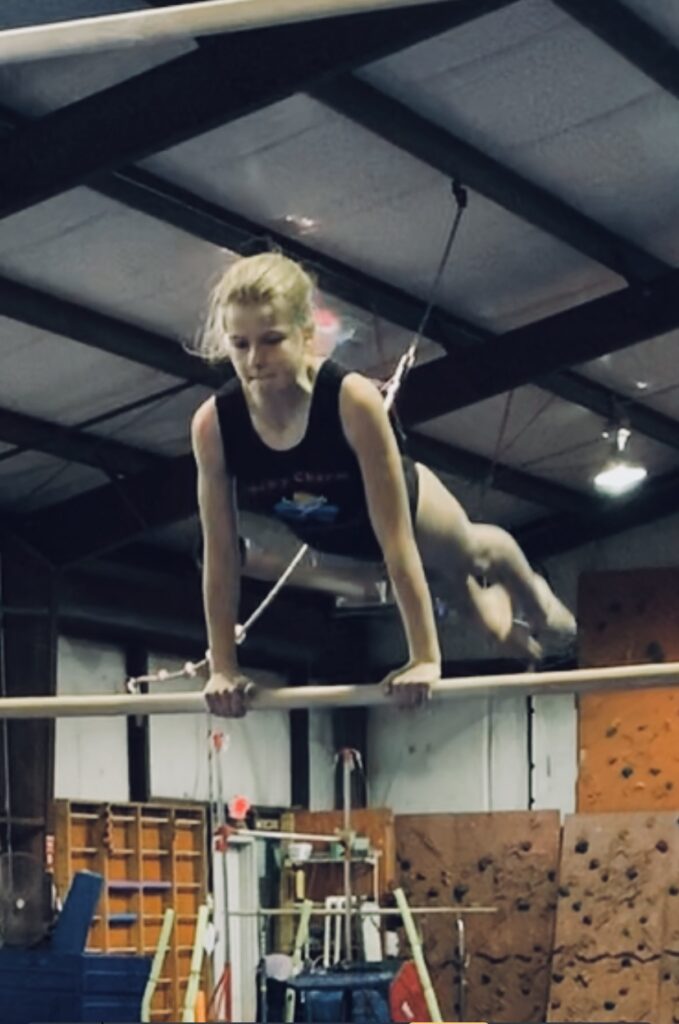 girl competing at gymnastics meet