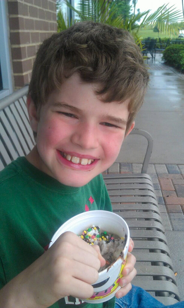 autistic boy eating ice cream