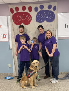 autism service dog and family